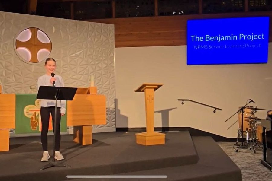 Annie presents her Benjamin Project at an NPMS Service Learning event
