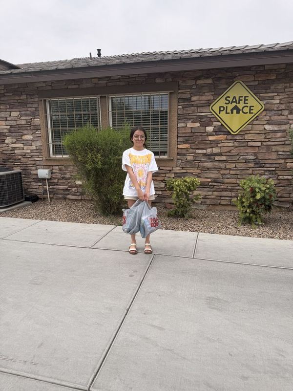 Nia delivering supplies to the Nevada Partnership for Homeless Youth